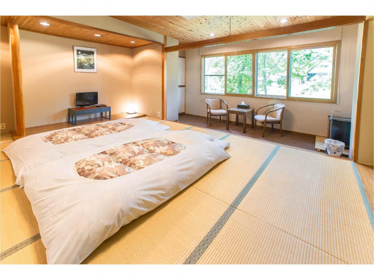 Nomad Hakuba Bed & Breakfast Bagian luar foto