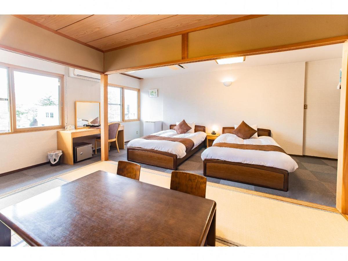 Nomad Hakuba Bed & Breakfast Bagian luar foto