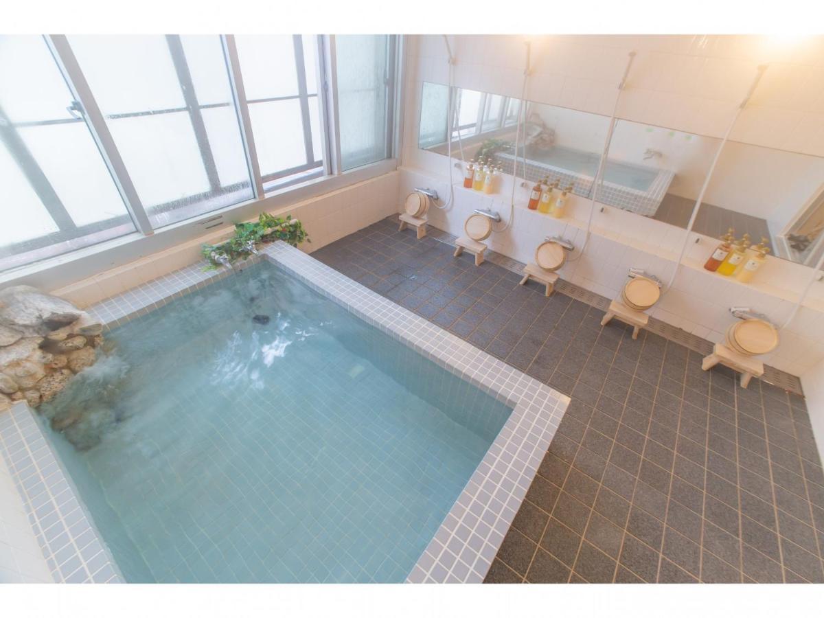 Nomad Hakuba Bed & Breakfast Bagian luar foto